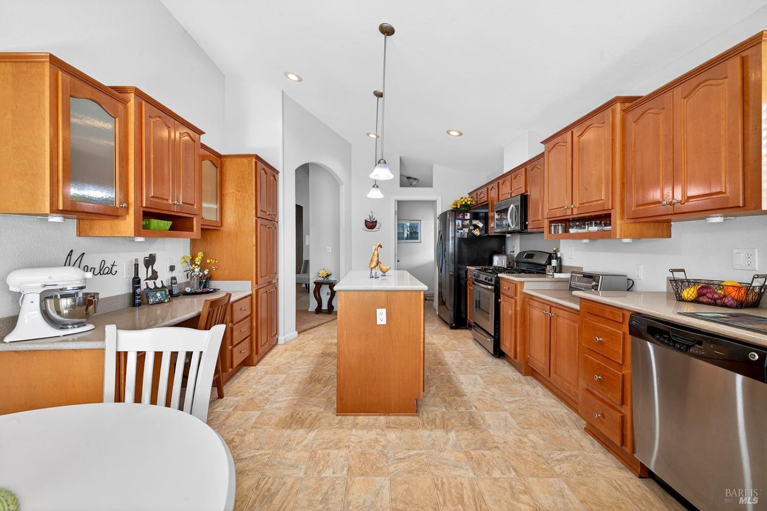 10 Shamrock Circle Santa Rosa, CA 95403 - Photo 15 of 39 a large kitchen with stainless steel appliances kitchen island granite countertop a sink a stove a dining table and chairs