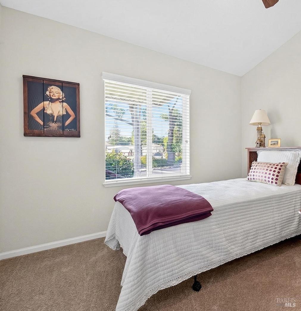 10 Shamrock Circle Santa Rosa, CA 95403 - Photo 23 of 39 a bedroom with a bed and a window