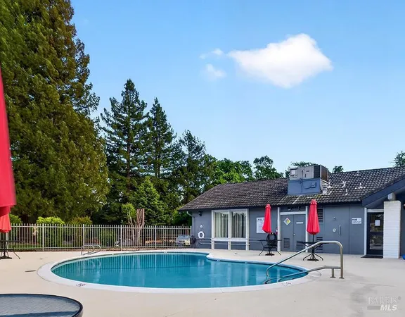 a view of a house with a swimming pool