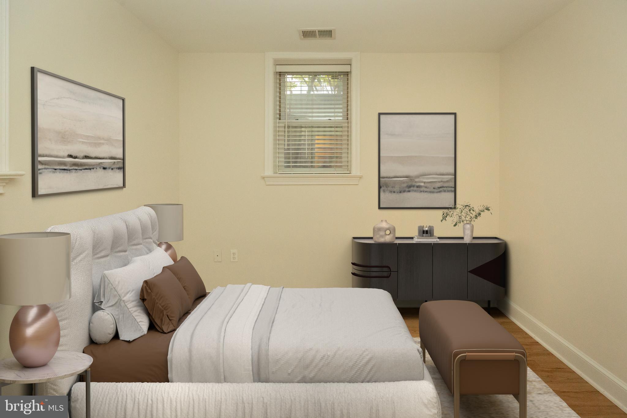 1323 Clifton Street Northwest, Unit 3 Washington, DC 20009 - Photo 19 of 32 a bedroom with a bed and a window