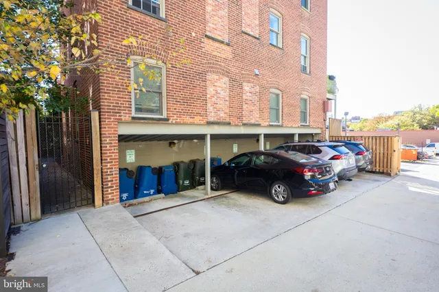 a car parked in front of a building