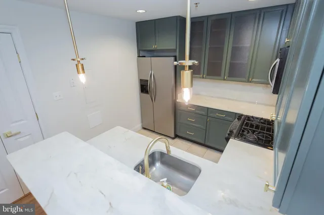 a bathroom with a sink and mirror