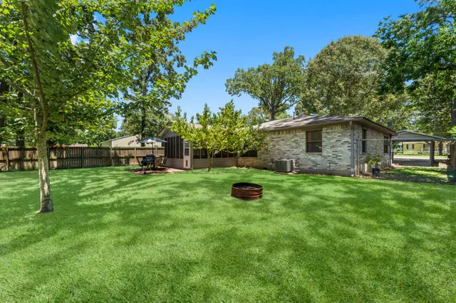 a backyard of a house with seating space