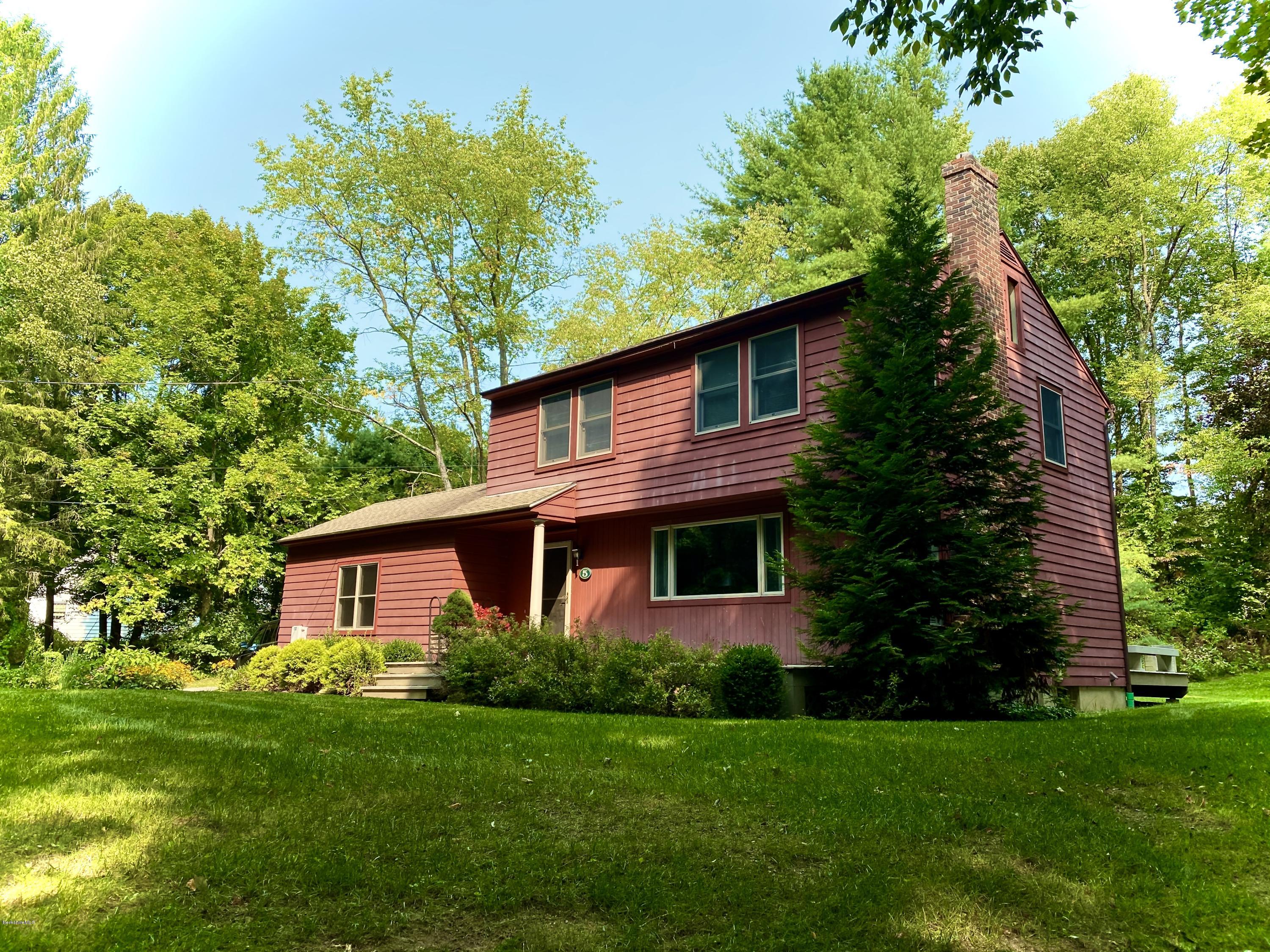 5 Hawthorne Road Lenox, MA 01240 - Photo 1 of 18 a front view of a house with a yard