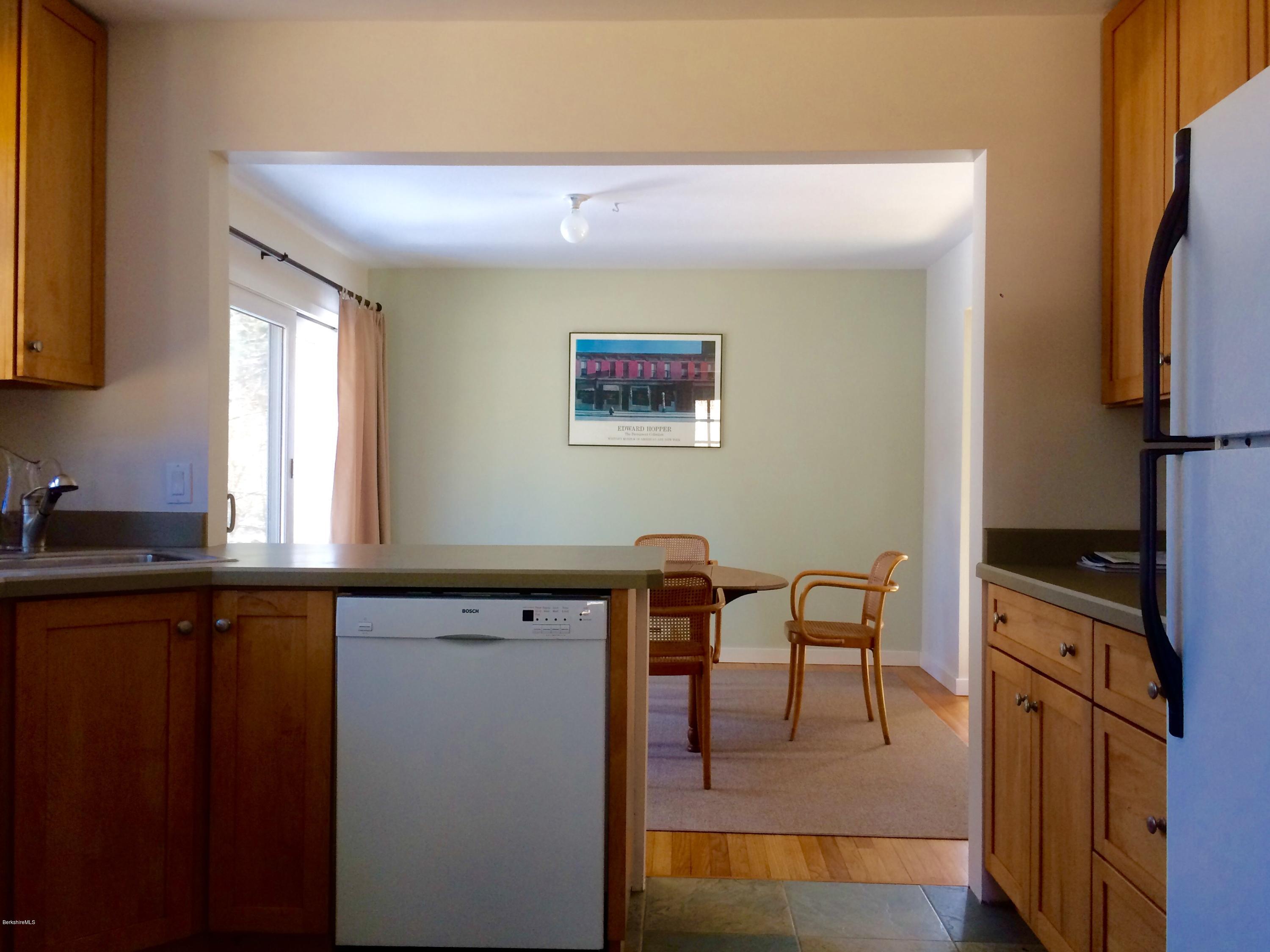 5 Hawthorne Road Lenox, MA 01240 - Photo 8 of 18 a view of kitchen with stainless steel appliances granite countertop a stove top oven a sink and dishwasher