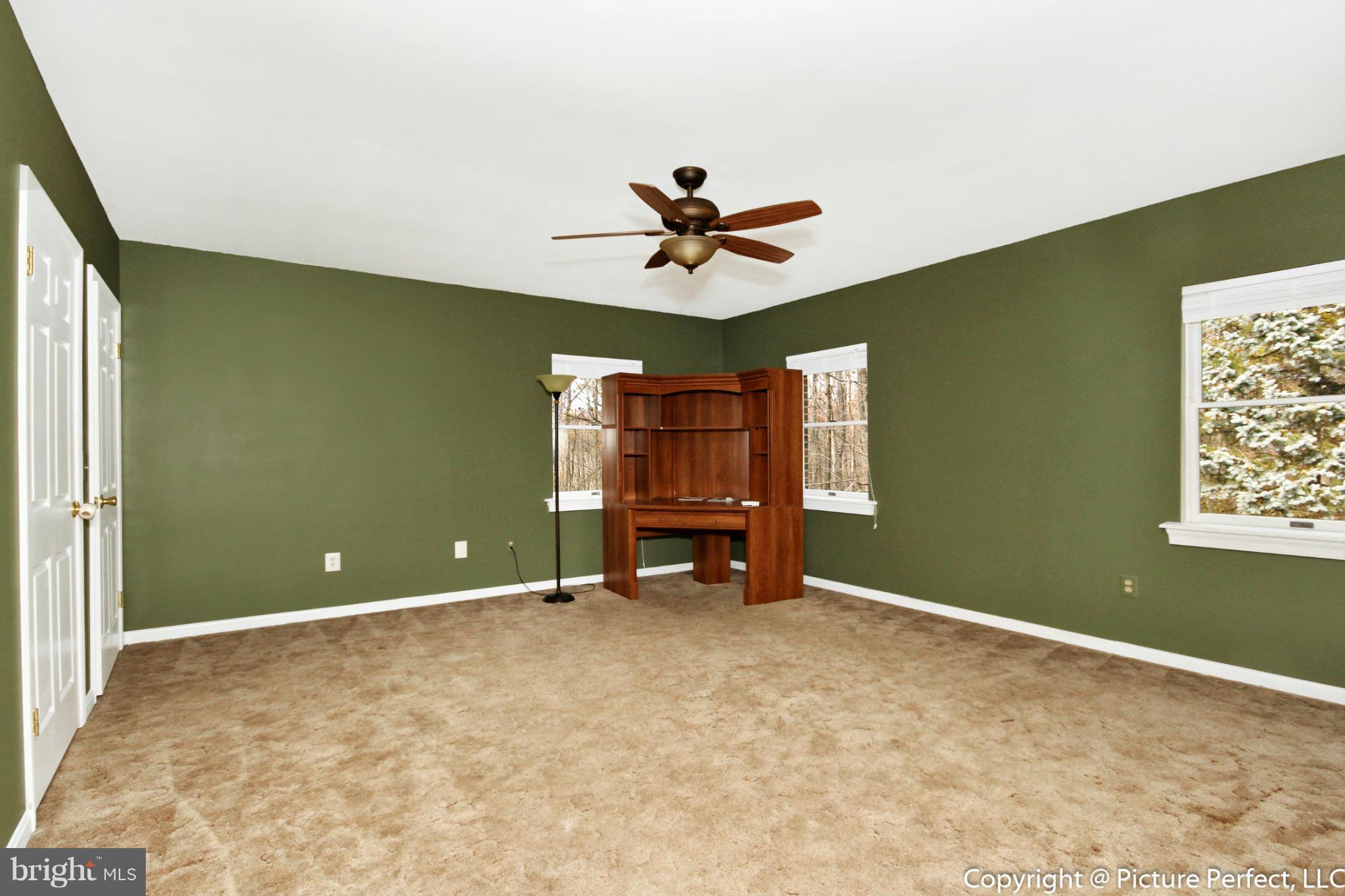 4911 Sundown Road Laytonsville, MD 20882 - Photo 16 of 21 a view of an empty room with a window