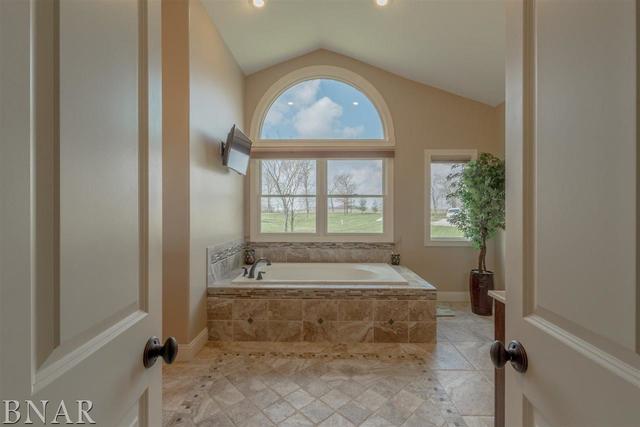 6286 Park Road Clinton, IL 61727 - Photo 12 of 45 a spacious bathroom with a tub and window
