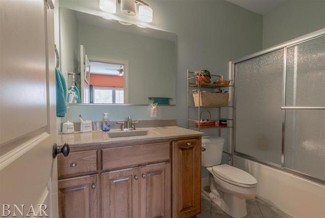 6286 Park Road Clinton, IL 61727 - Photo 19 of 45 a bathroom with a sink toilet and vanity
