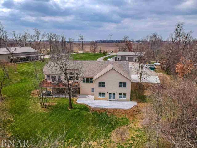6286 Park Road Clinton, IL 61727 - Photo 32 of 45 a view of a house with a yard table and chairs