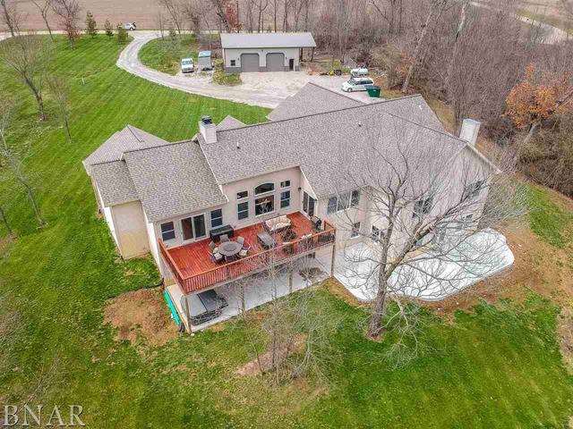 6286 Park Road Clinton, IL 61727 - Photo 33 of 45 an aerial view of a house with garden space and trees