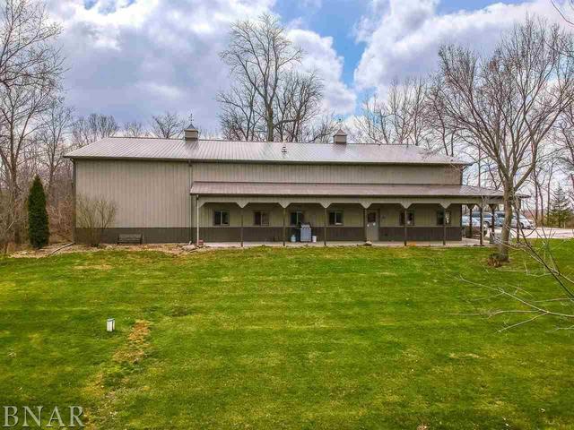 6286 Park Road Clinton, IL 61727 - Photo 37 of 45 a front view of a house with a garden