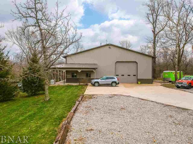6286 Park Road Clinton, IL 61727 - Photo 38 of 45 a house view with a garden space