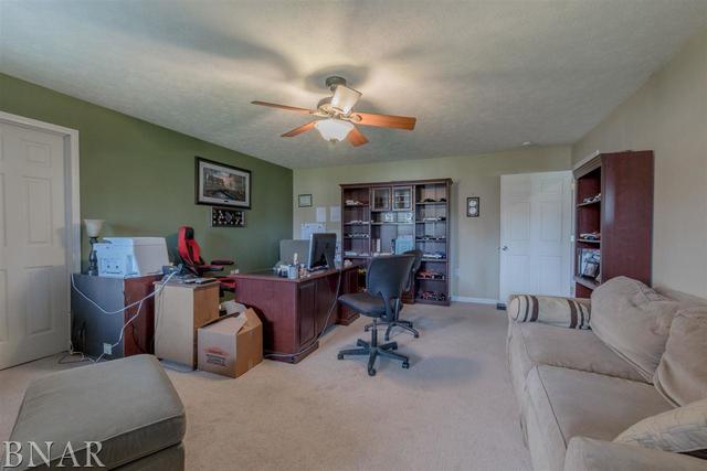 6286 Park Road Clinton, IL 61727 - Photo 43 of 45 a living room with furniture and a flat screen tv