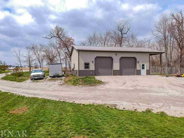 6286 Park Road Clinton, IL 61727 - Photo 44 of 45 a front view of a house with a yard and garage