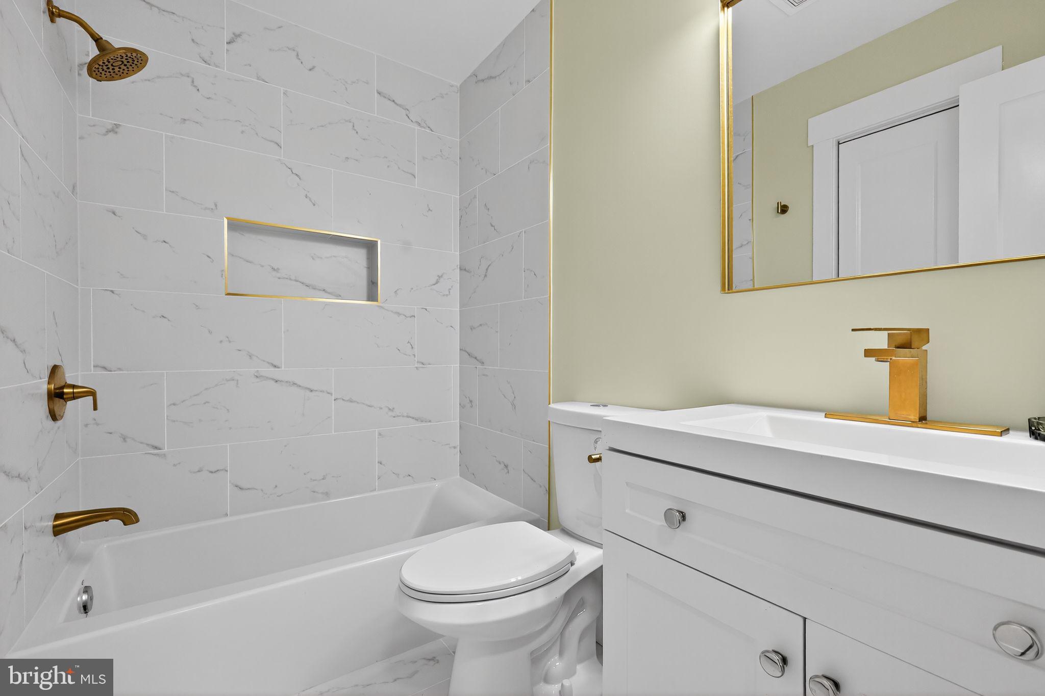 1943 South Lowell Street Arlington, VA 22204 - Photo 19 of 29 a bathroom with a sink a toilet and a bathtub