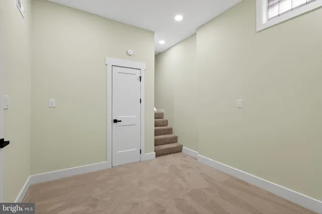 an empty room with a hallway