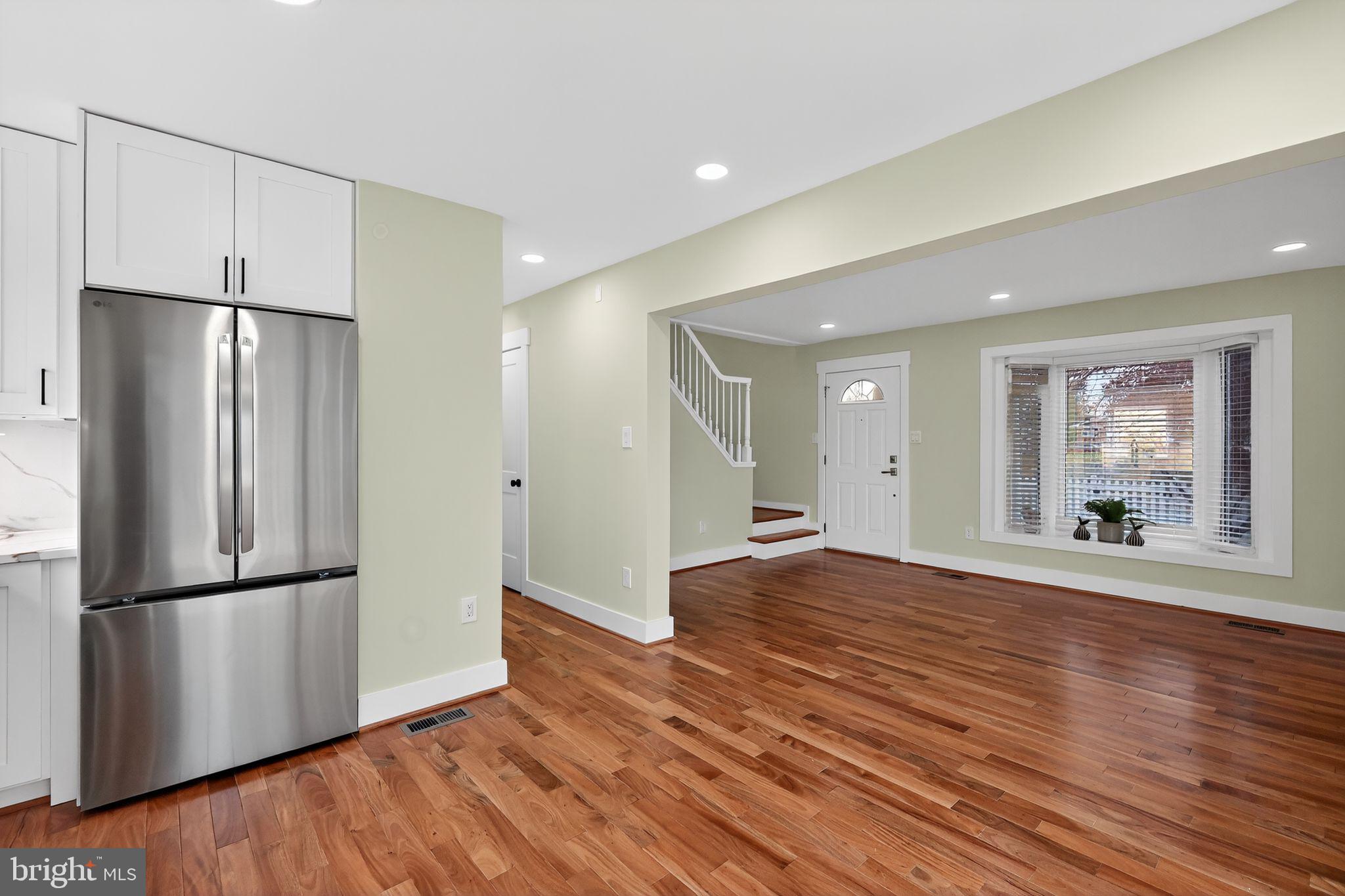 1943 South Lowell Street Arlington, VA 22204 - Photo 7 of 29 a view of empty room with wooden floor and window