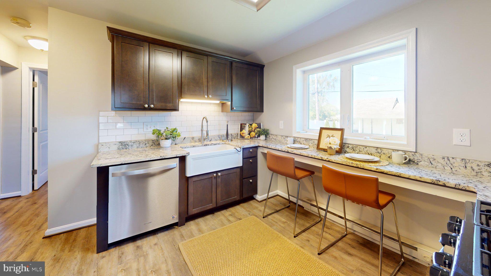 7711 Fairgreen Road Dundalk, MD 21222 - Photo 5 of 18 Modern kitchen with natural light.
