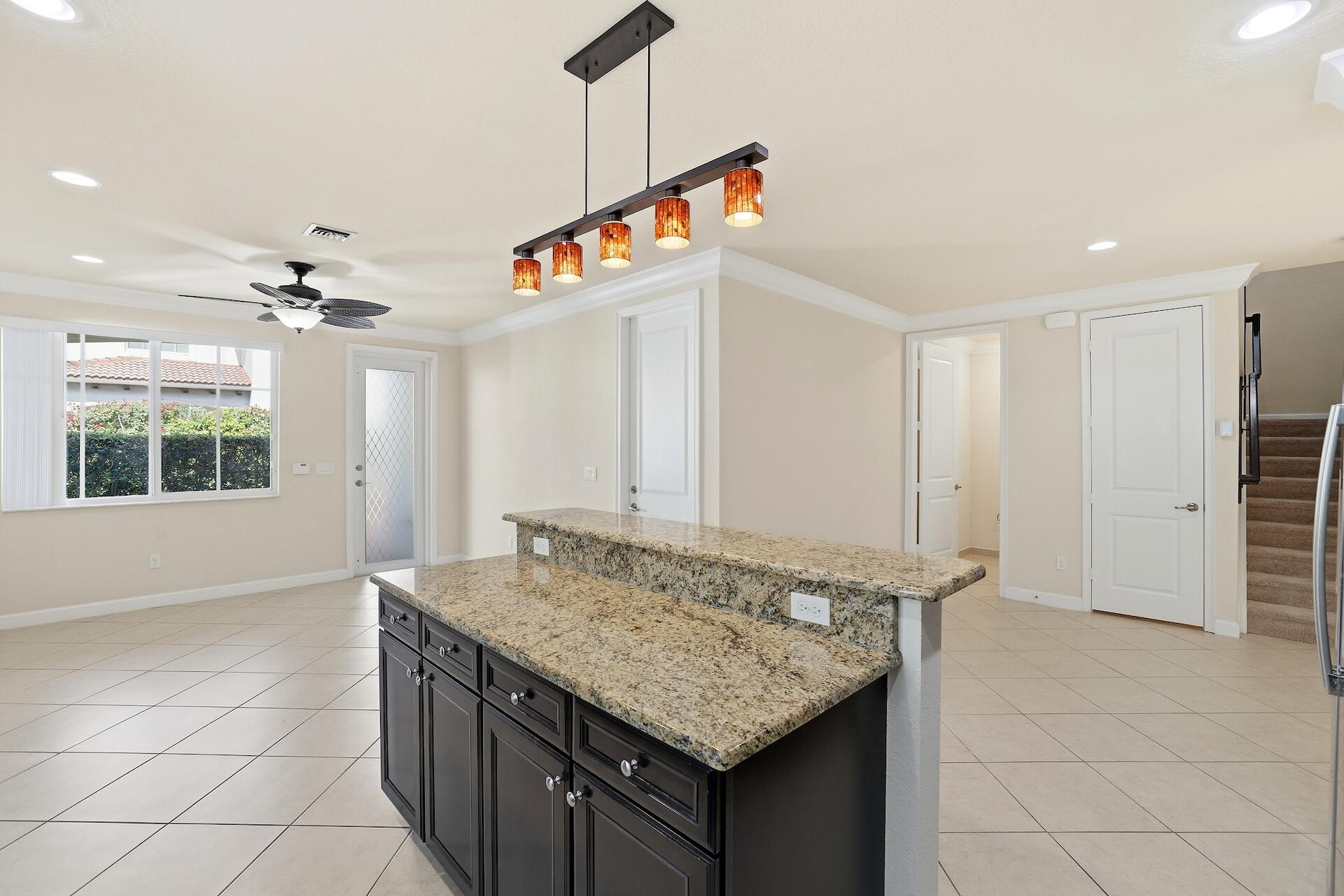 148 Northwest Emerson Place Boca Raton, FL 33432 - Photo 12 of 44 Kitchen Island