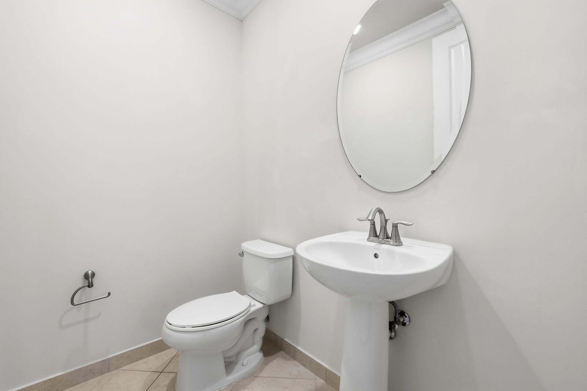 148 Northwest Emerson Place Boca Raton, FL 33432 - Photo 15 of 44 Half bathroom 1st Floor