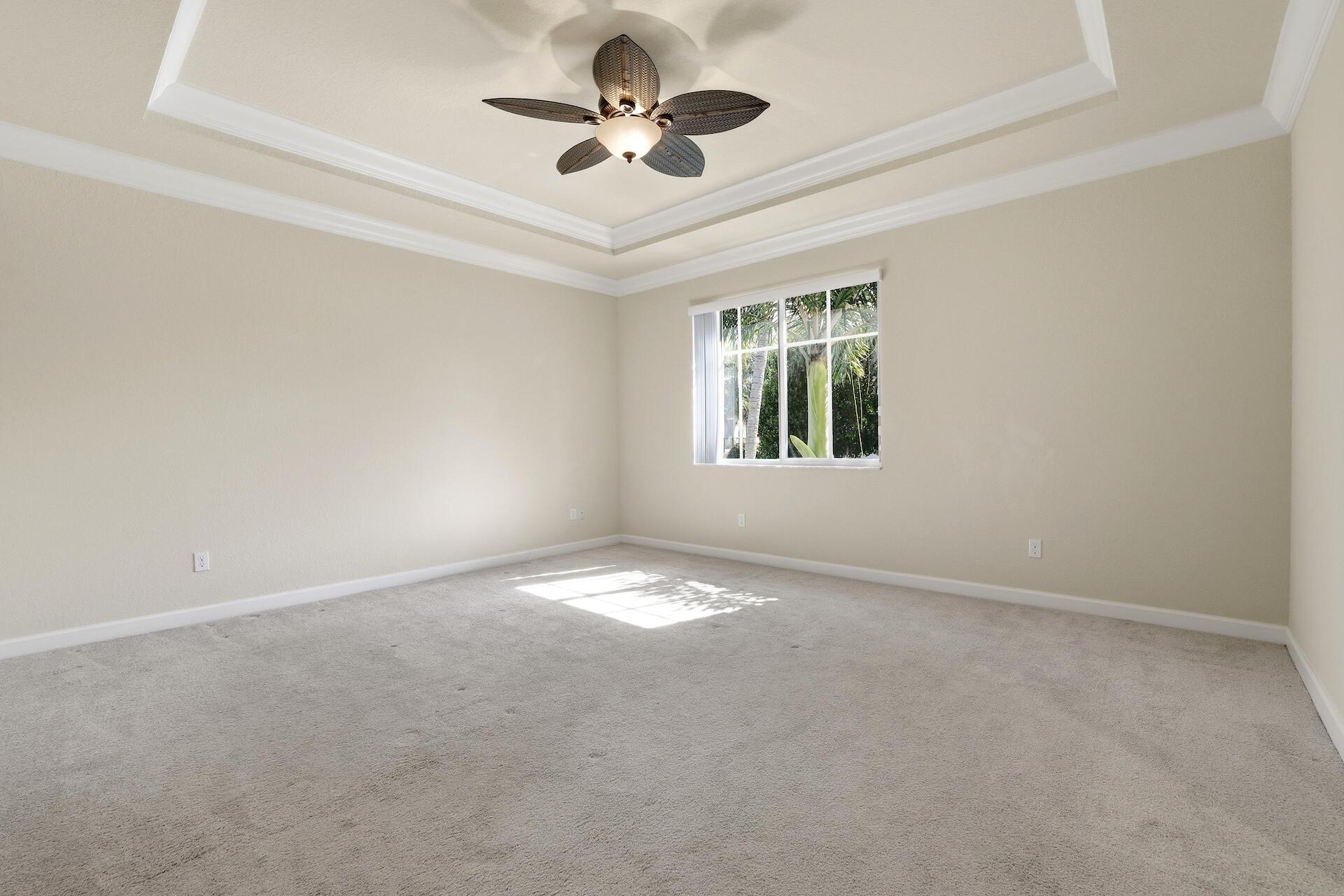 148 Northwest Emerson Place Boca Raton, FL 33432 - Photo 19 of 44 Primary Bedroom