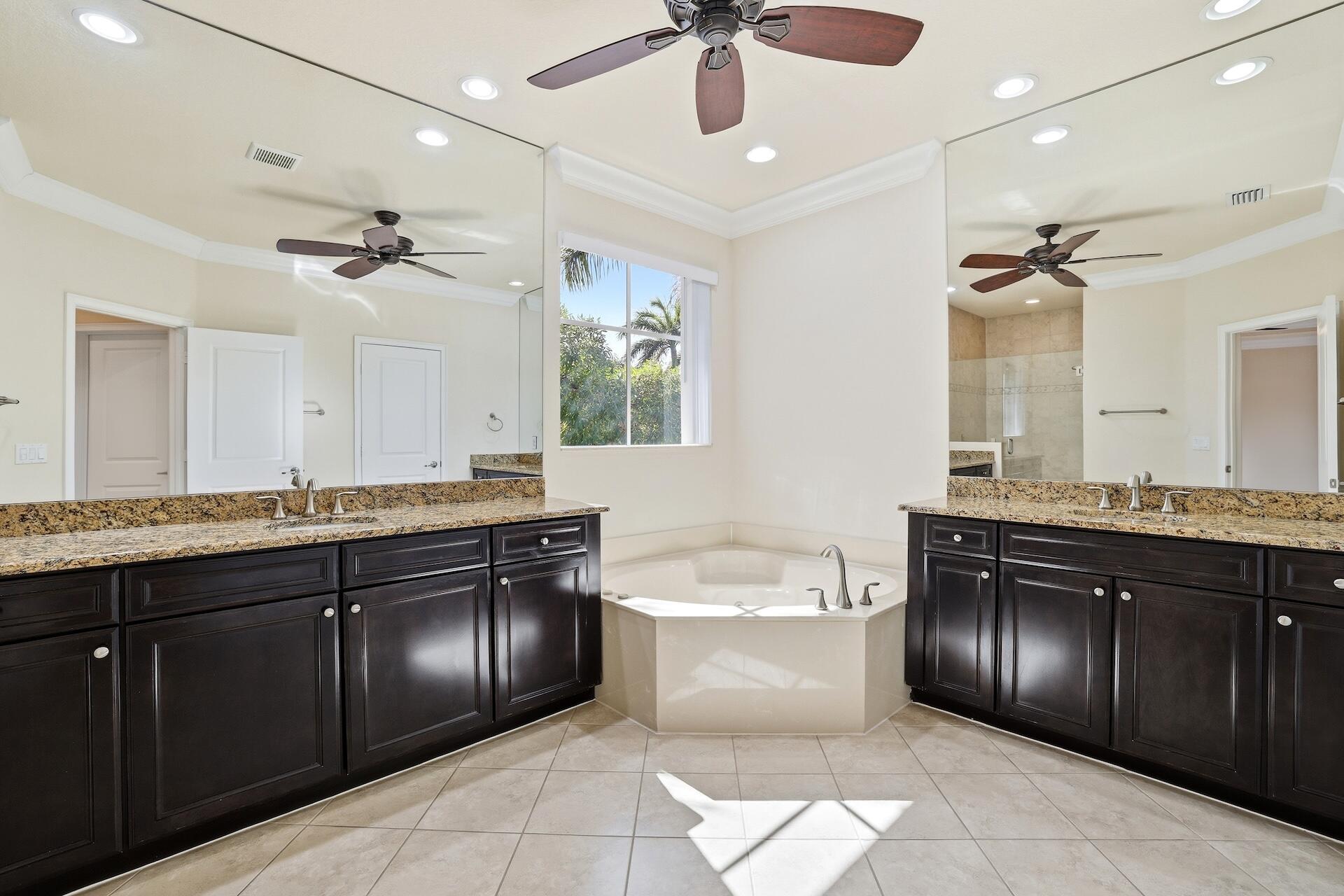 148 Northwest Emerson Place Boca Raton, FL 33432 - Photo 22 of 44 Primary Bathroom Double Vanities