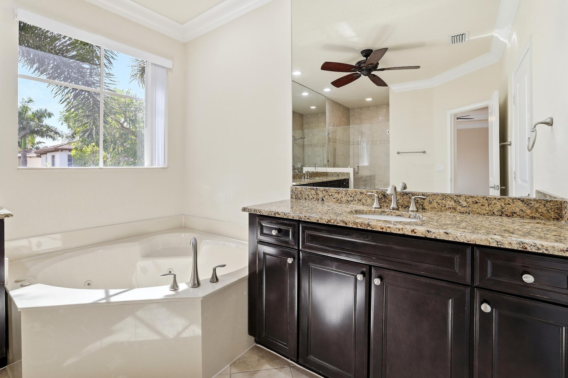 148 Northwest Emerson Place Boca Raton, FL 33432 - Photo 24 of 44 Primary Bathroom with Jacuzzi Tub