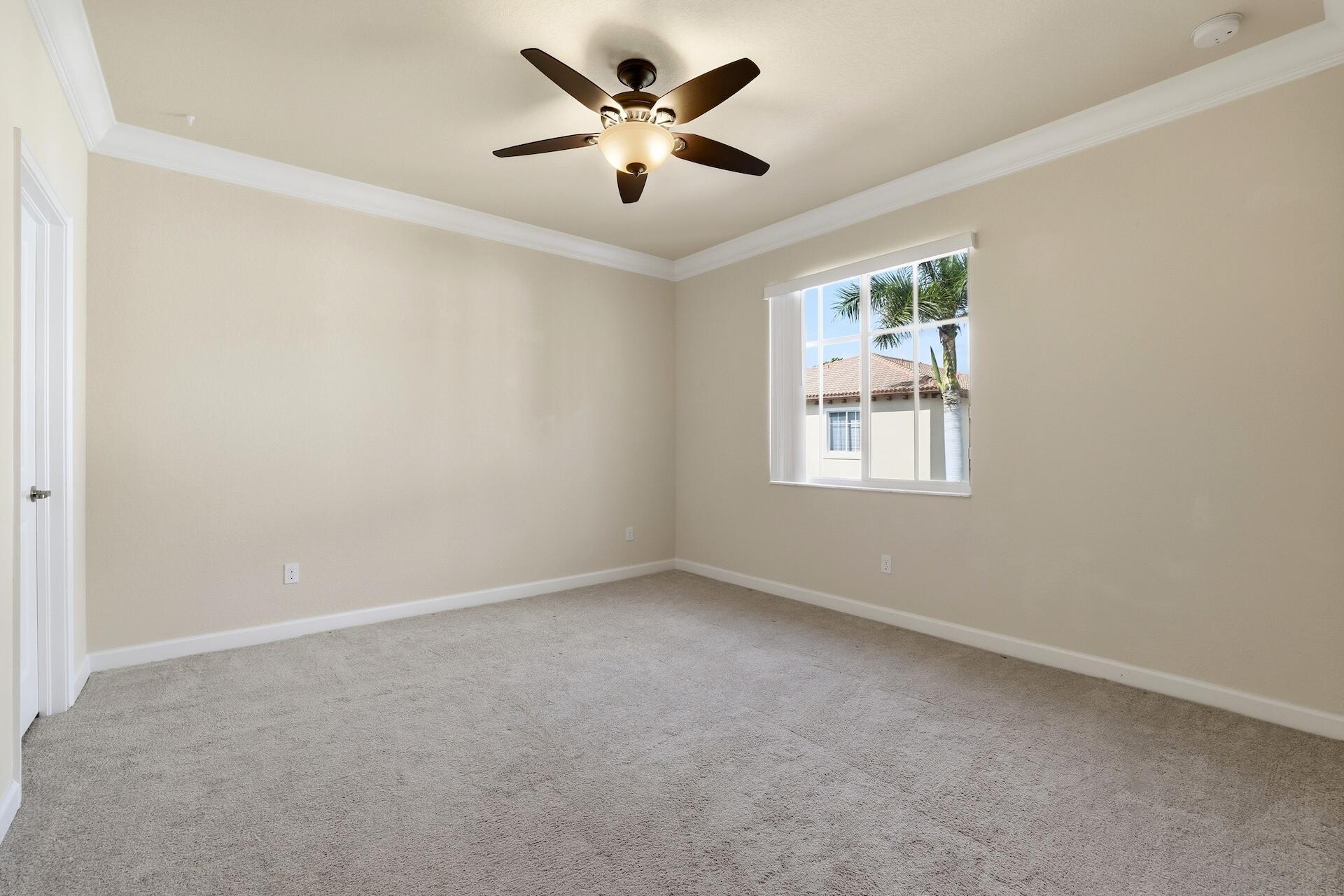 148 Northwest Emerson Place Boca Raton, FL 33432 - Photo 26 of 44 Middle Bedroom