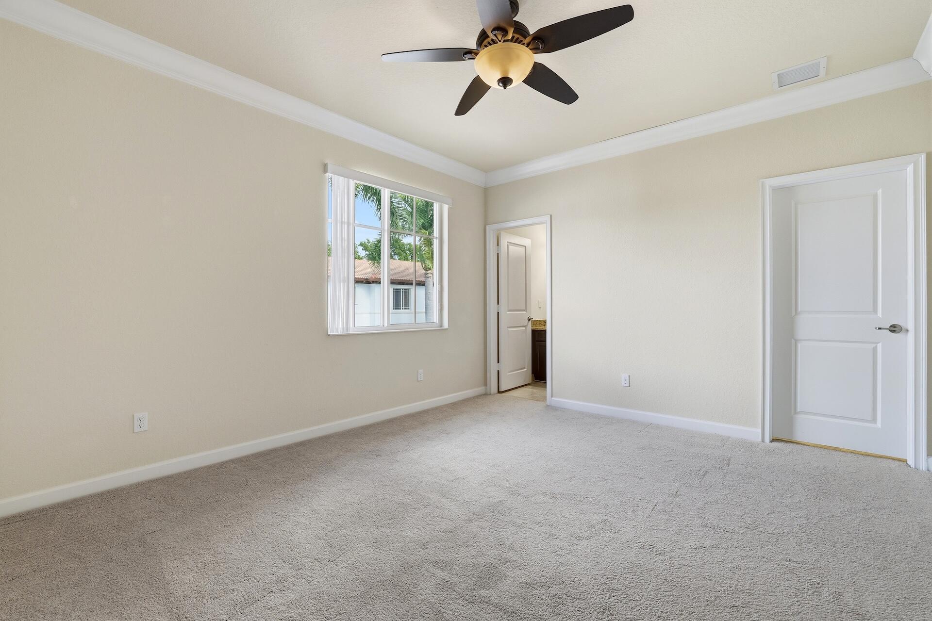 148 Northwest Emerson Place Boca Raton, FL 33432 - Photo 29 of 44 Back Bedroom