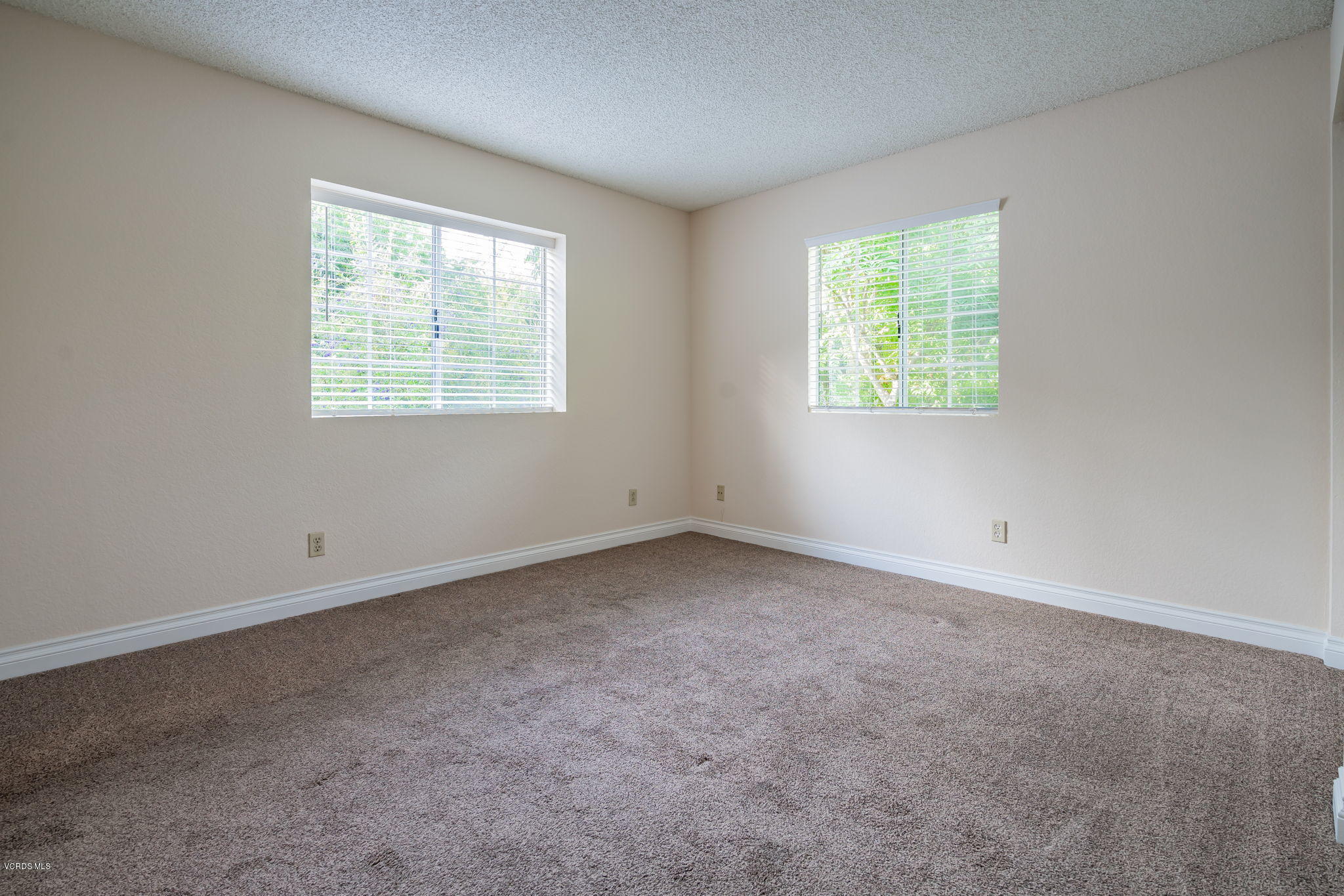1067 Waltham Road, Unit D Simi Valley, CA 93065 - Photo 14 of 31 an empty room with windows