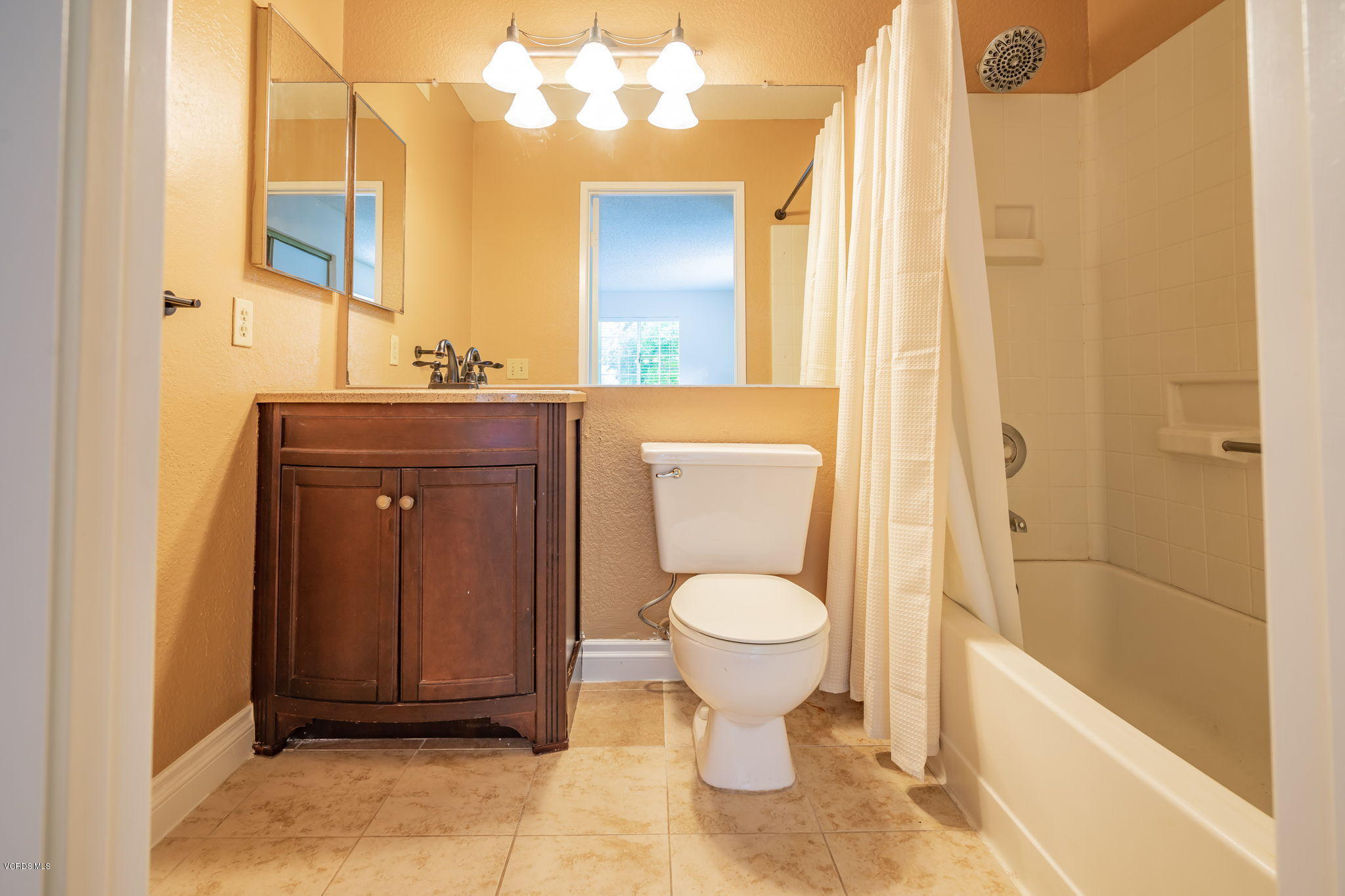 1067 Waltham Road, Unit D Simi Valley, CA 93065 - Photo 17 of 31 a bathroom with a sink a toilet and shower