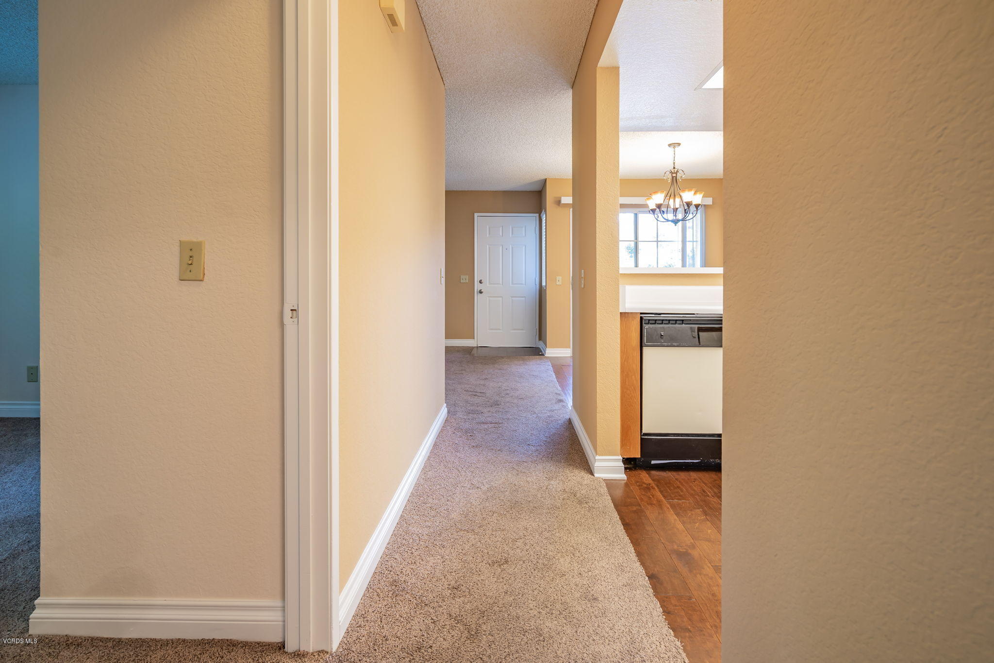 1067 Waltham Road, Unit D Simi Valley, CA 93065 - Photo 23 of 31 a view of a hallway with wooden floor