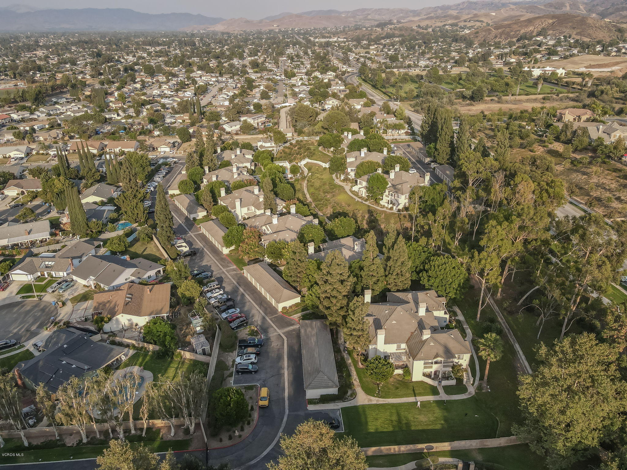 1067 Waltham Road, Unit D Simi Valley, CA 93065 - Photo 28 of 31 an aerial view of a residential houses with outdoor space and covered with trees