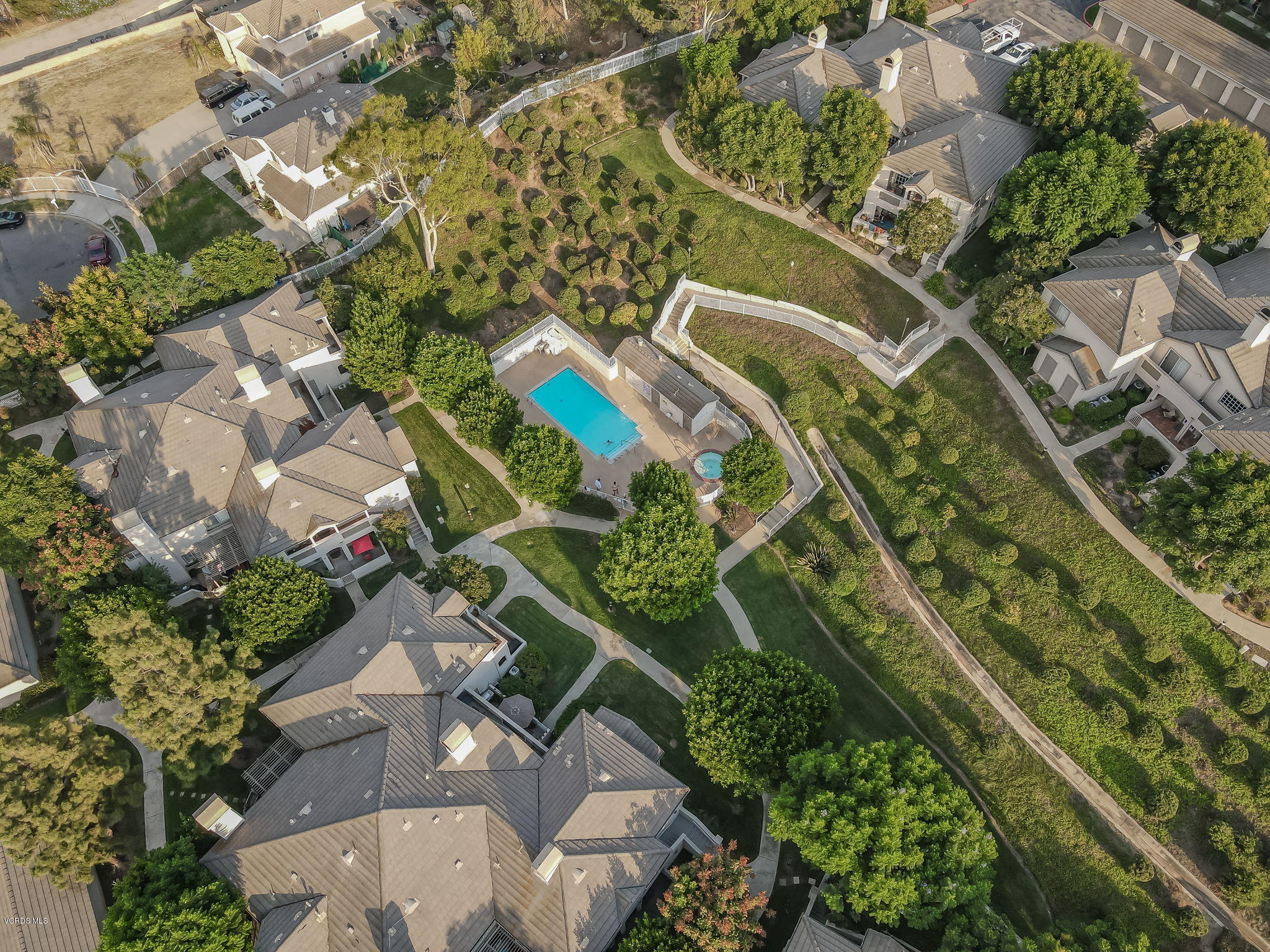 1067 Waltham Road, Unit D Simi Valley, CA 93065 - Photo 30 of 31 an aerial view of a house with a yard and greenery