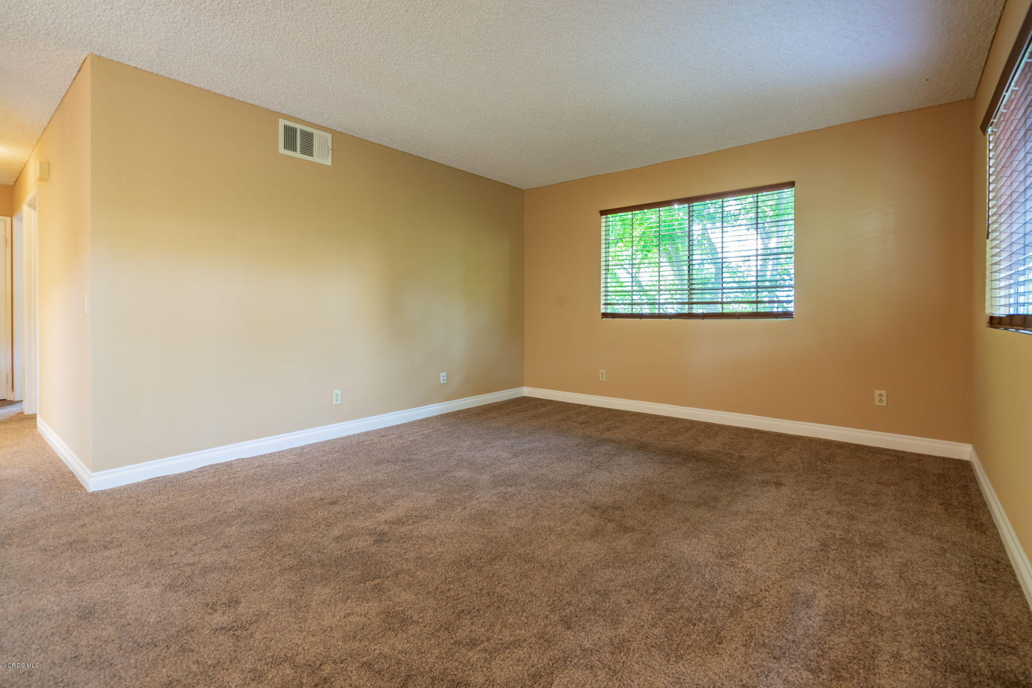 1067 Waltham Road, Unit D Simi Valley, CA 93065 - Photo 4 of 31 an empty room with windows