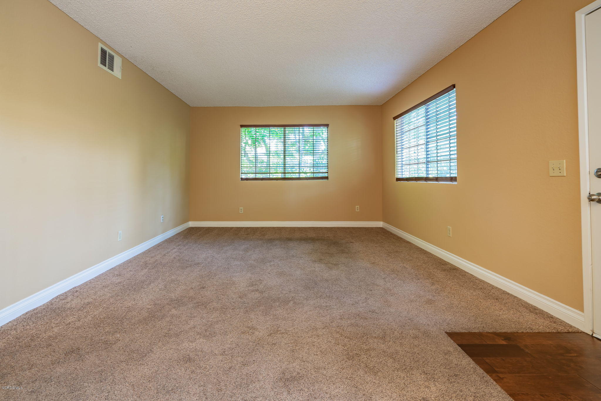1067 Waltham Road, Unit D Simi Valley, CA 93065 - Photo 5 of 31 an empty room with windows