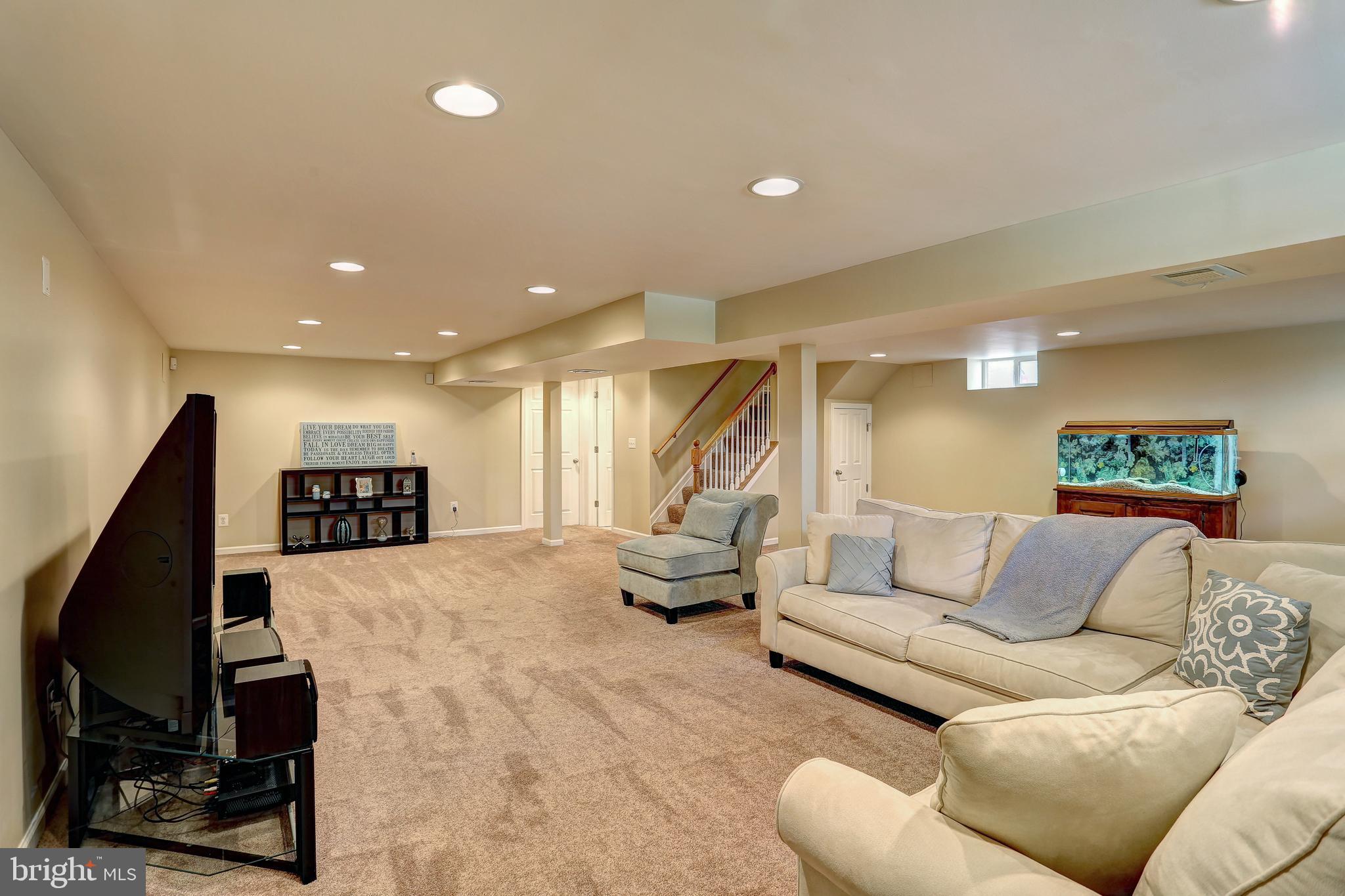 2104 Gaybrook Road Baltimore, MD 21244 - Photo 16 of 29 Lower Level rec room - new carpet, recessed lights