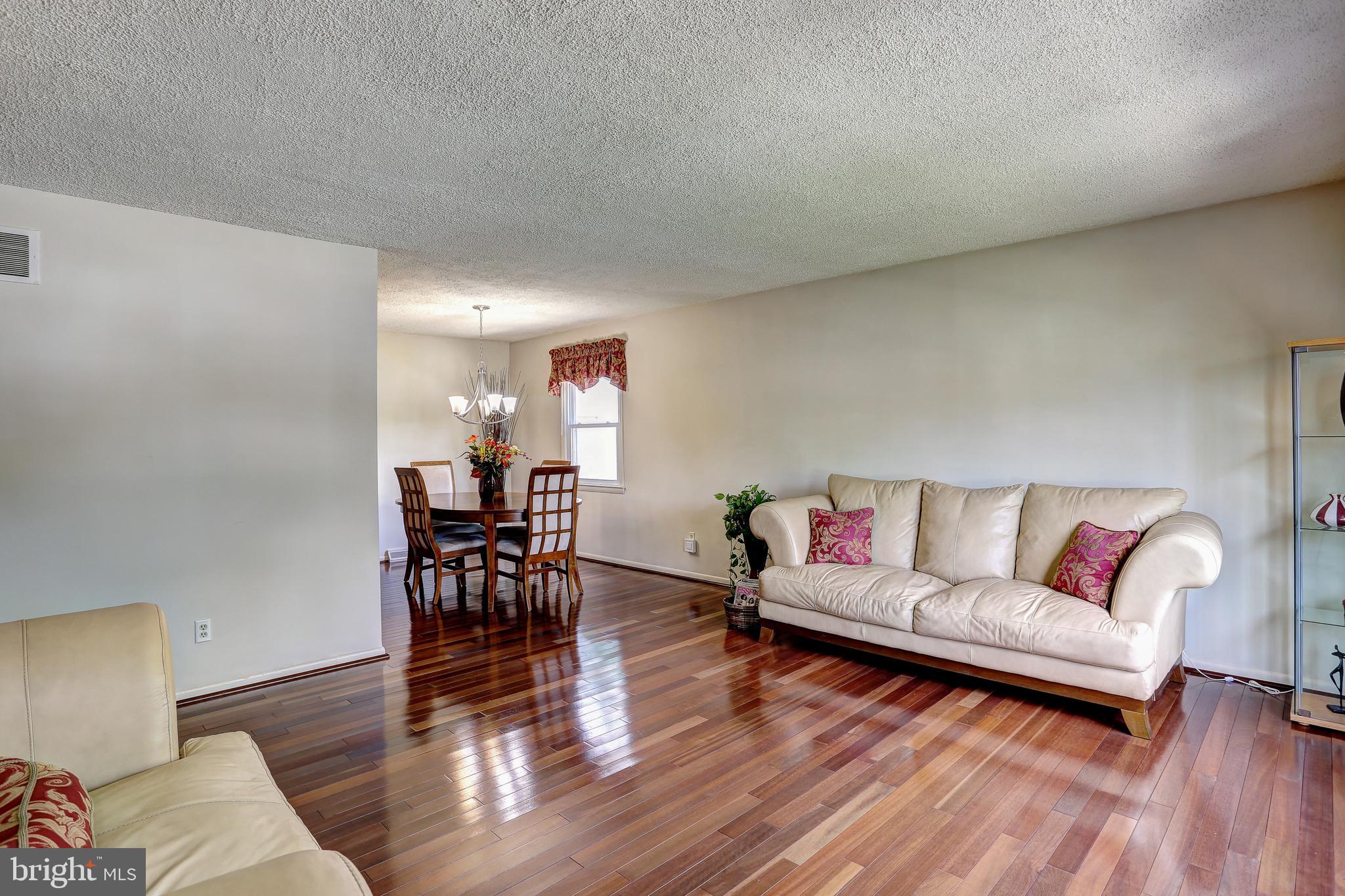 2104 Gaybrook Road Baltimore, MD 21244 - Photo 3 of 29 LR features gleaming brazilian cherry wood flrs
