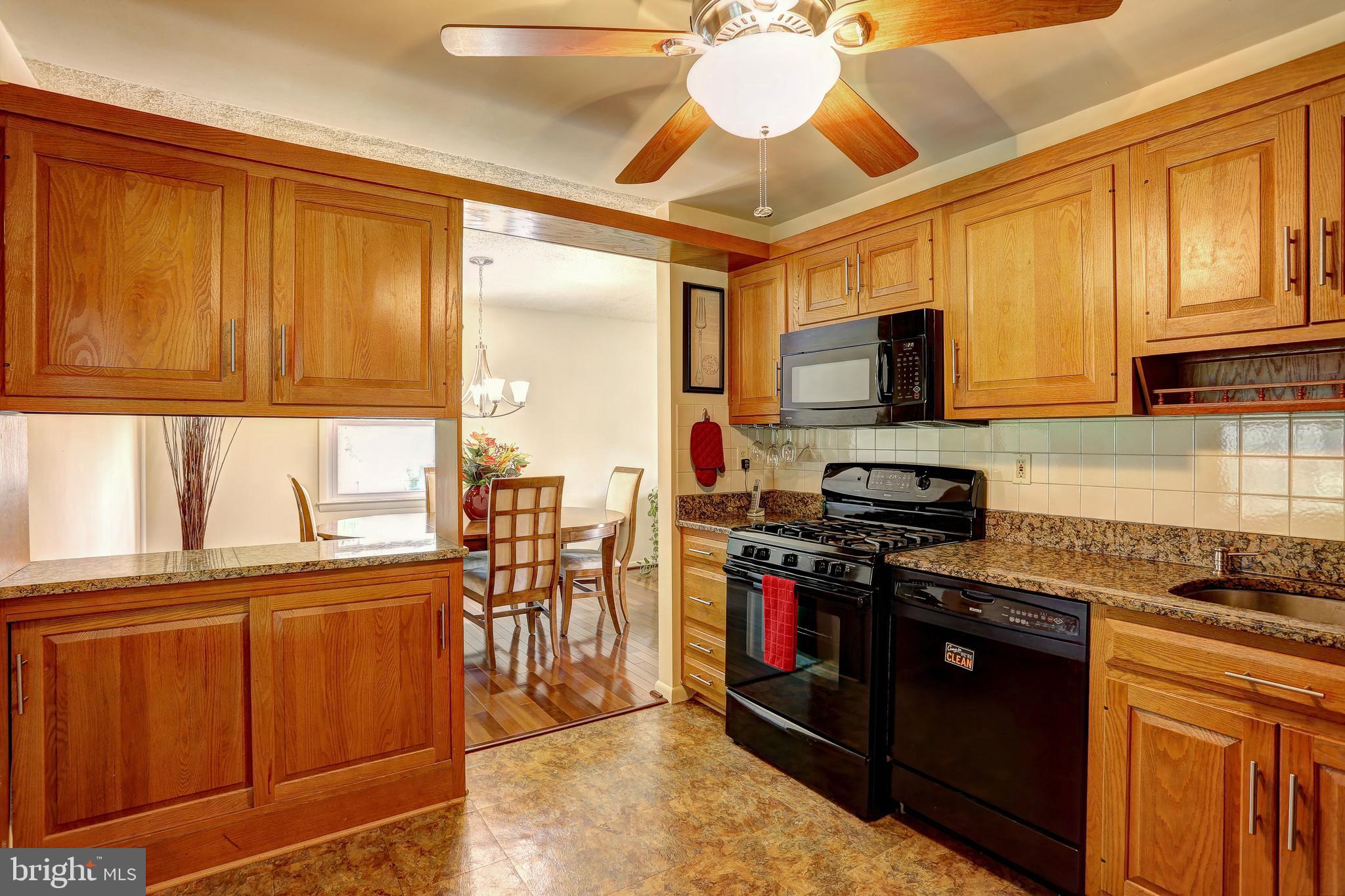 2104 Gaybrook Road Baltimore, MD 21244 - Photo 4 of 29 Kitchen offers lots of cabinet space, gas range