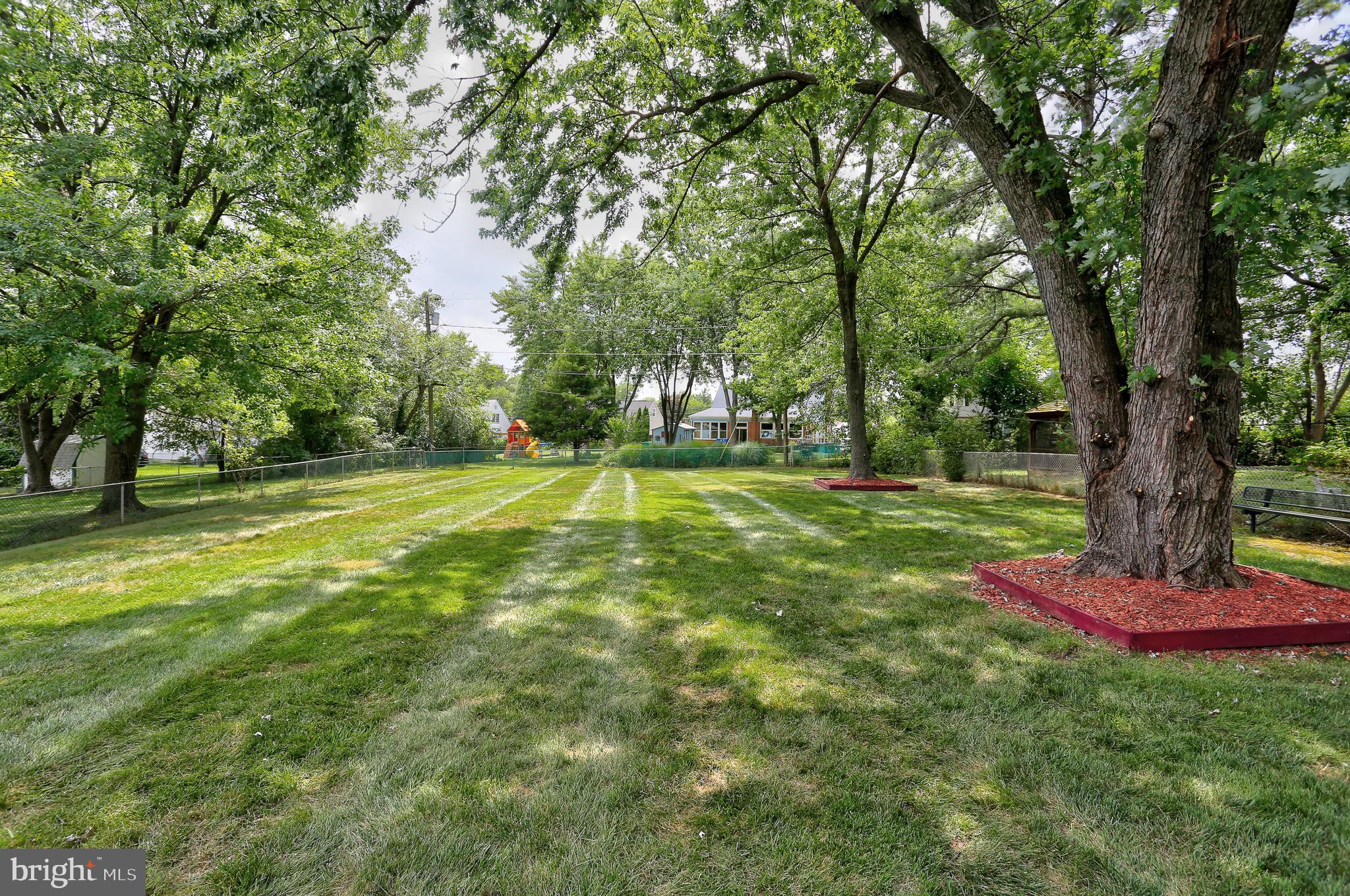2104 Gaybrook Road Baltimore, MD 21244 - Photo 6 of 29 Gorgeous fenced yard with manicured lawn and shade