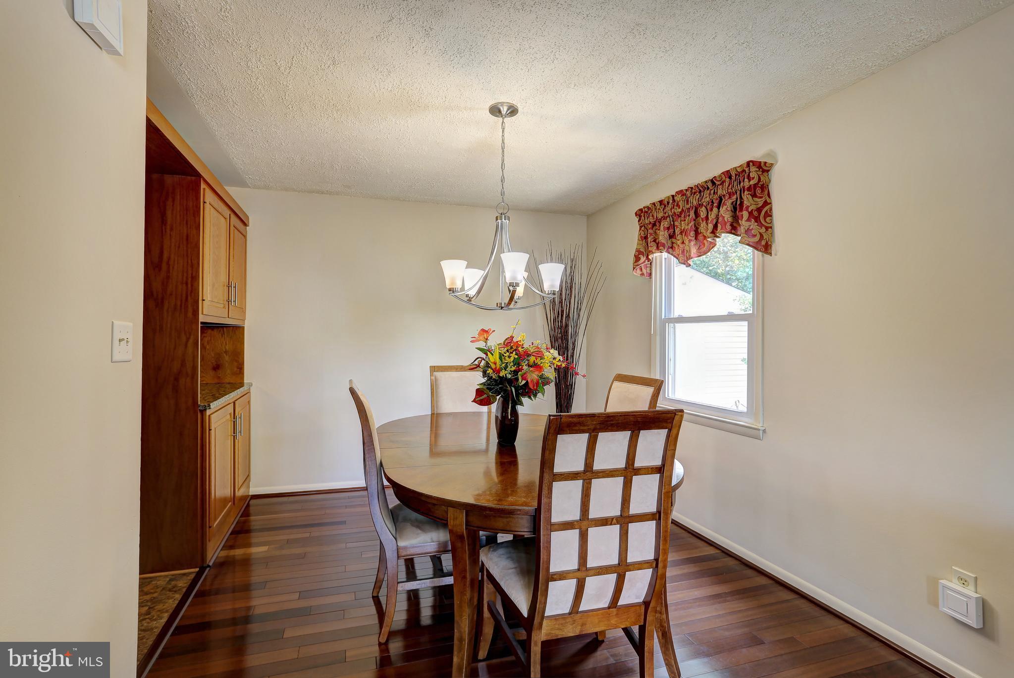 2104 Gaybrook Road Baltimore, MD 21244 - Photo 9 of 29 Formal DR also features updated light fixtures