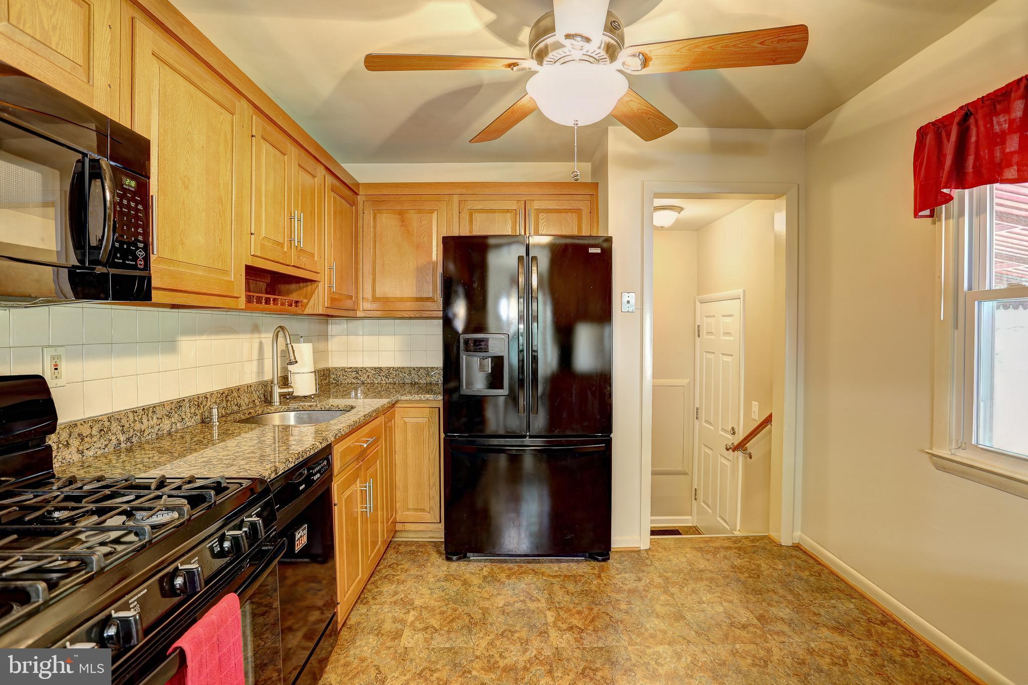 2104 Gaybrook Road Baltimore, MD 21244 - Photo 10 of 29 Kit features granite counter top, gas range