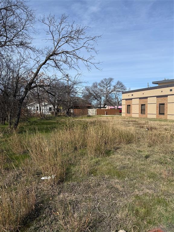 708 South 9th Street Temple, TX 76504 - Photo 6 of 8 a view of a lake with houses in the background