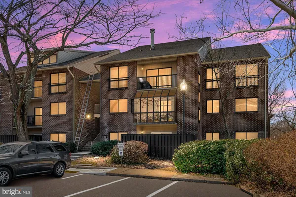 a cars parked in front of a building