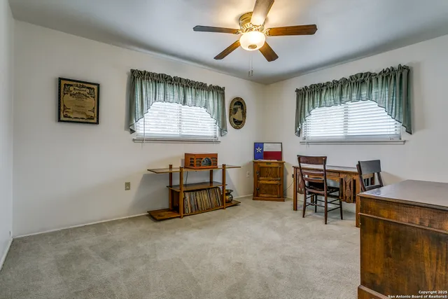 a view of a livingroom with furniture