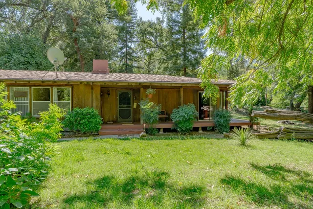 a view of swimming pool with a yard