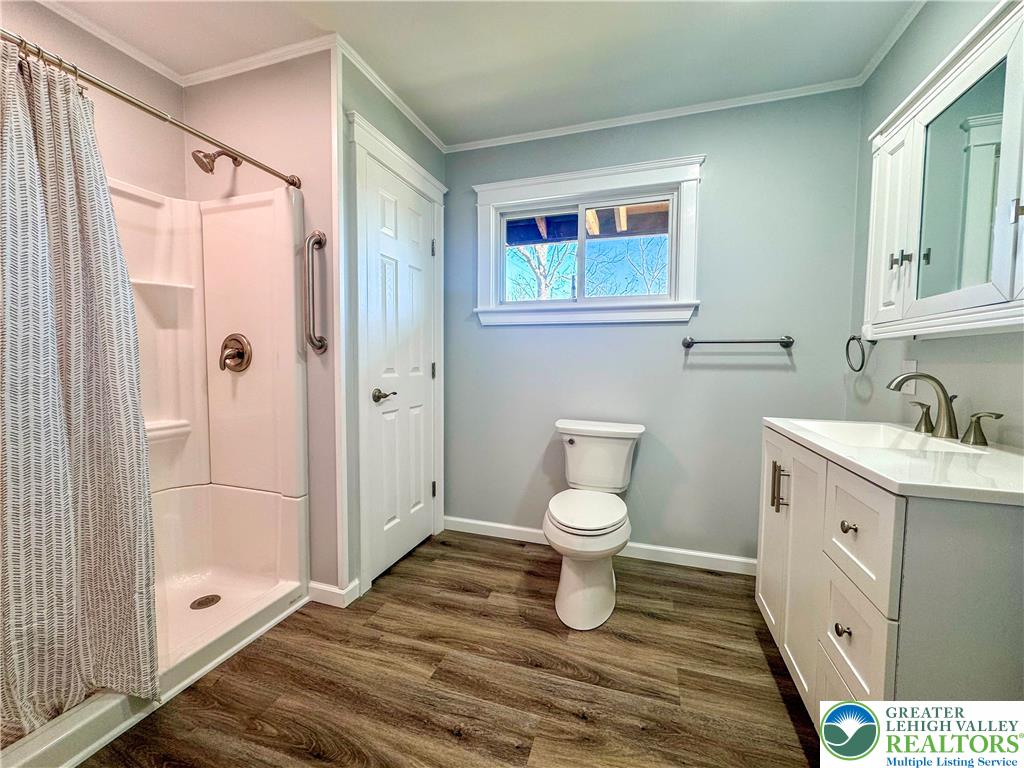 1350 Kunkletown Road, Unit 201 Saylorsburg, PA 18353 - Photo 11 of 15 a bathroom with a sink and a mirror