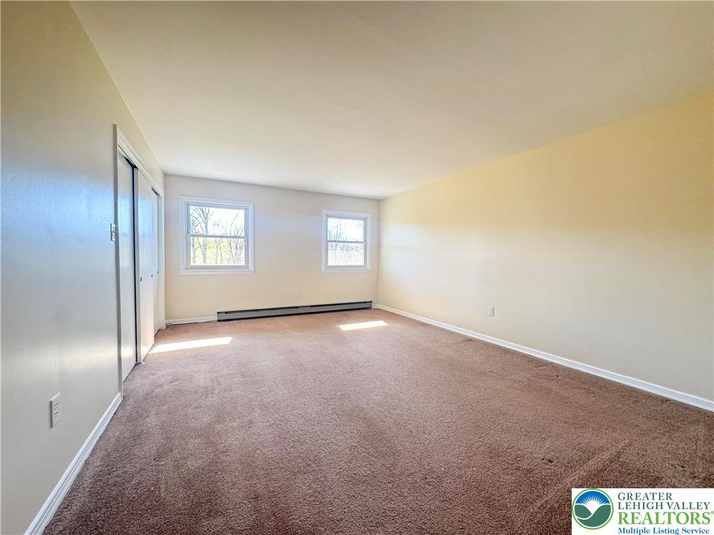 1350 Kunkletown Road, Unit 201 Saylorsburg, PA 18353 - Photo 15 of 15 an empty room with windows and closet