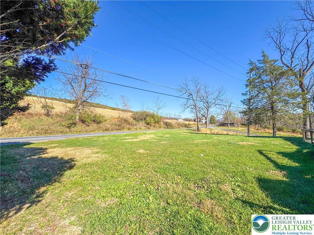 1350 Kunkletown Road, Unit 201 Saylorsburg, PA 18353 - Photo 2 of 15 a view of an outdoor space and a yard