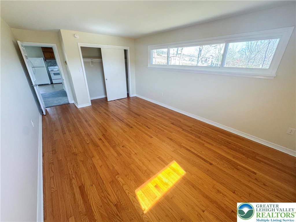 1350 Kunkletown Road, Unit 201 Saylorsburg, PA 18353 - Photo 10 of 15 a view of empty room with wooden floor
